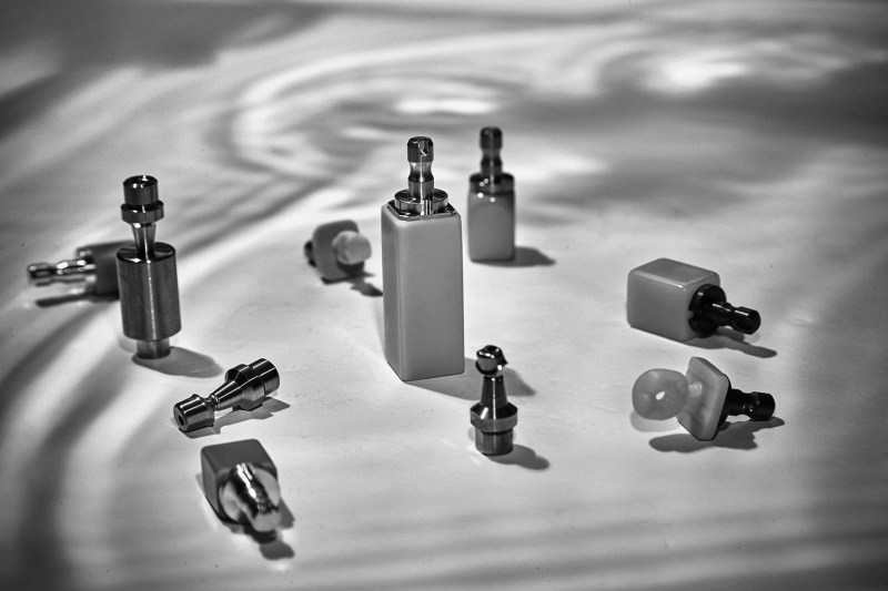 ARUM A3 benchtop mill in black and white, angled front view