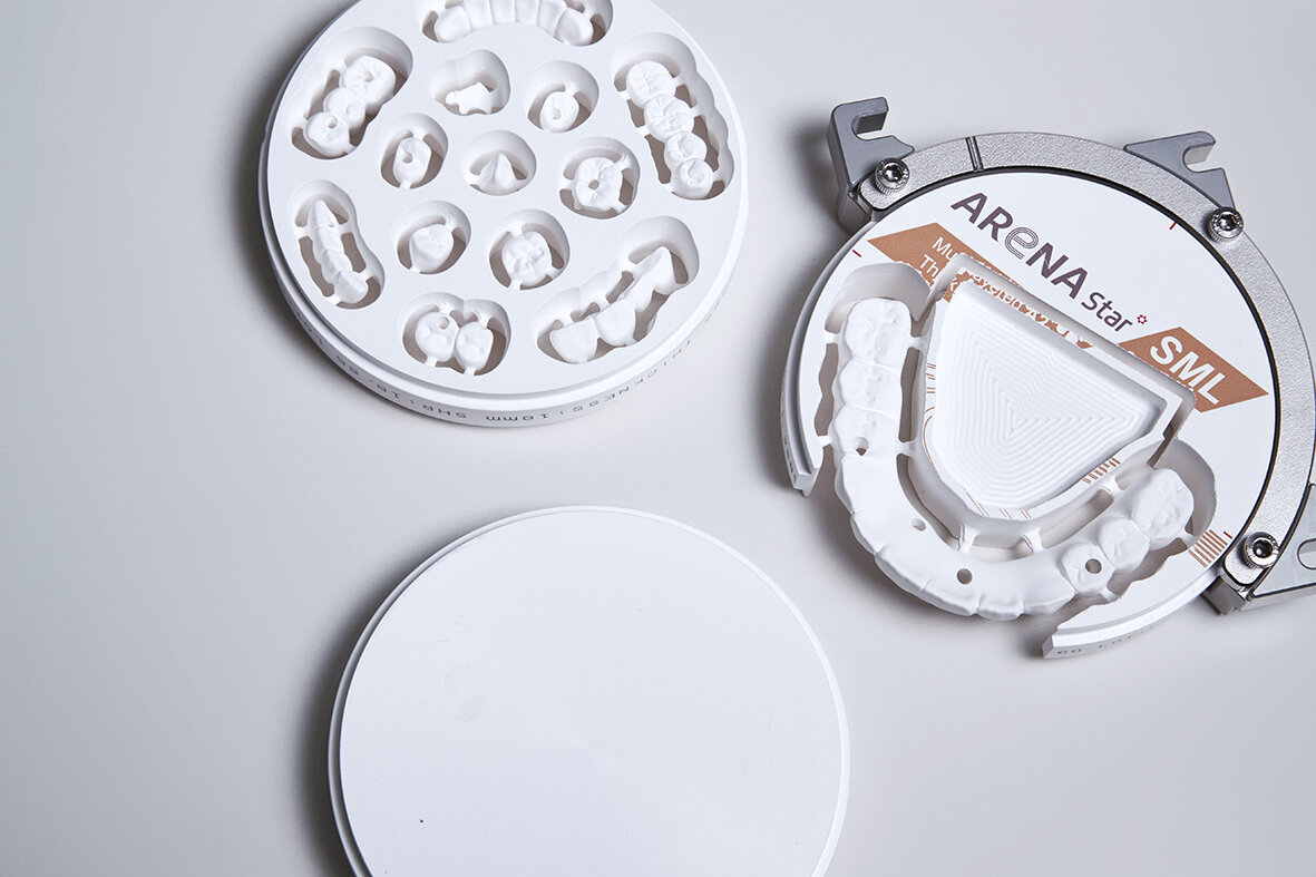 ARUM A3 Pro staged with milling discs and restorative materials