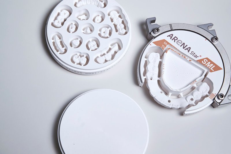 Milled zirconia arch still nested in its disc