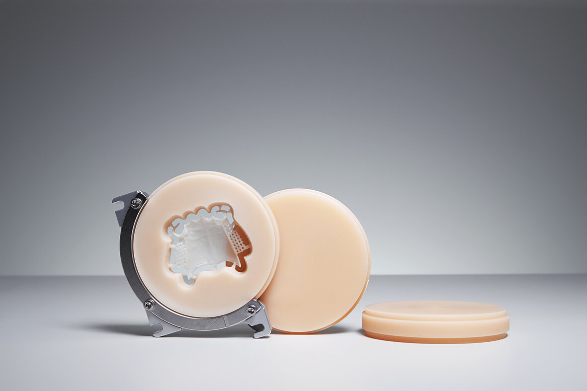 PMMA discs and a milled arch on the bench